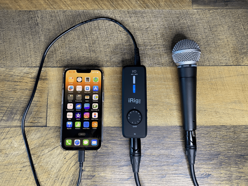 The iRig Pro connected to a microphone and smartphone
