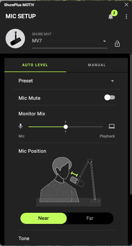 the shure plus motiv app. it's a black background with green sliders and buttons to control "near" and "far" mode for the shure mv7